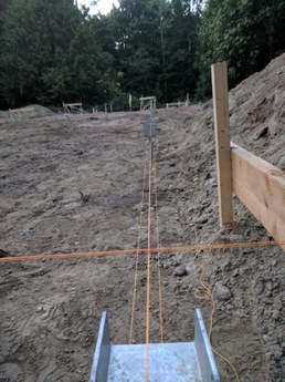 SIPS home on helical pile foundation
